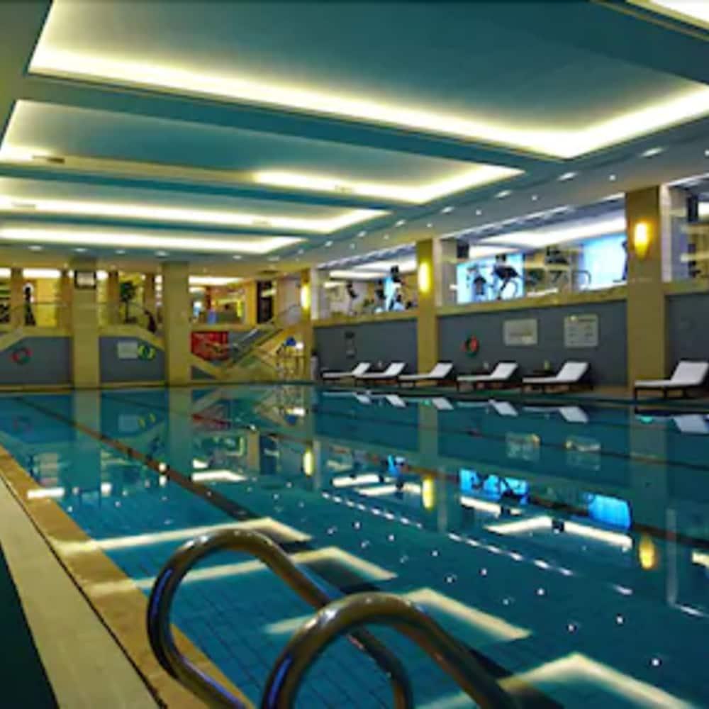 New Century Hotel Taizhou Тайжу Екстериор снимка